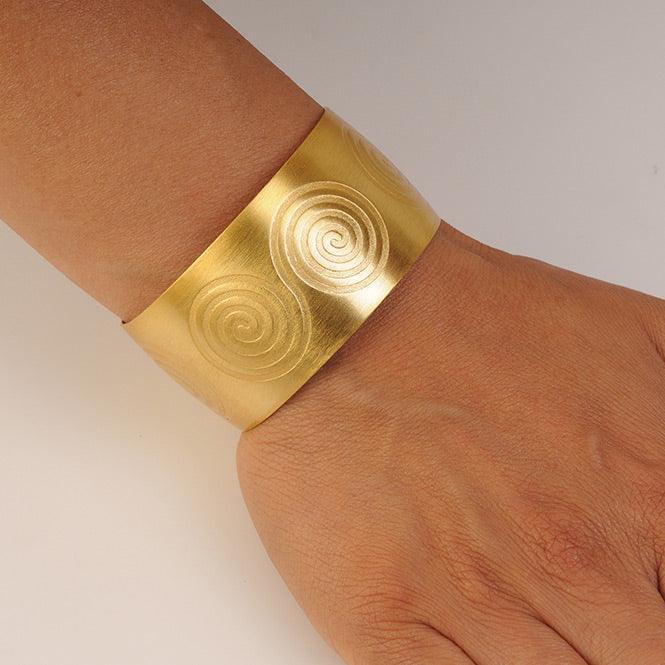 Brazalete de Aro Pictograma Espiral Doble