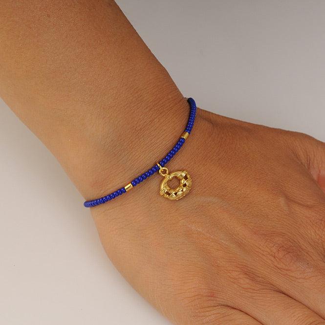 Pulsera Cristal Checo Mini Azul Rey y Dije Mini Nariguera Calima
