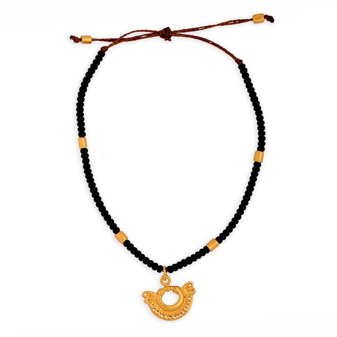 Pulsera Cristal Checo Mini Negra y Dije Mini Nariguera Serpiente dos Cabezas Tairona